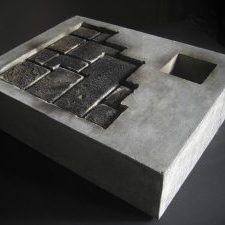 Photograph of concrete block with cut out section showing brickwork. By artist Marcos Kaiser, resident at GlogauAIR January 2020