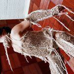 Photograph of costume made of elastic bands and string by artist Astrid Lloyd, resident at GlogauAIR 2019
